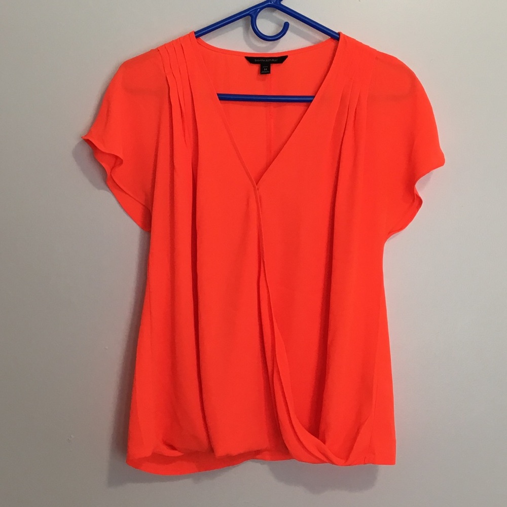 Banana Republic bright orange blouse.